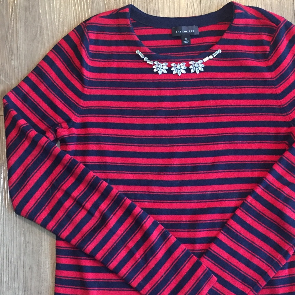 Sweater with rhinestone accents.